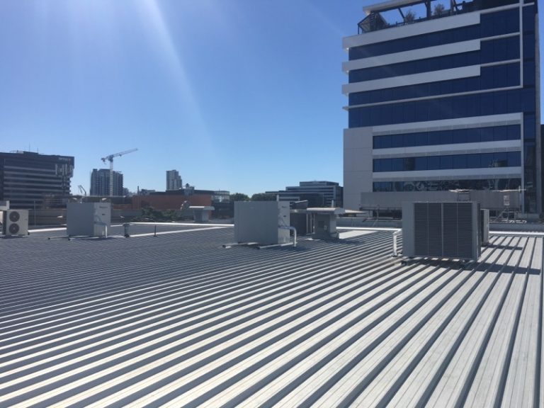 Air conditioners on a roof | LCM Air Conditioning
