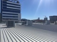 Air conditioners on a roof | LCM Air Conditioning